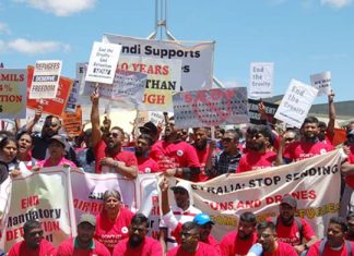 Six months since the election, Canberra rally demands action on permanent visas